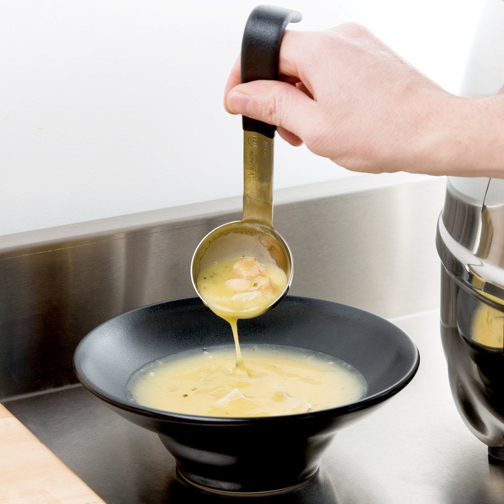 Vollrath Jacob's Pride 2 oz. One-Piece Stainless Steel Ladle with Short Black Kool-Touch® Handle