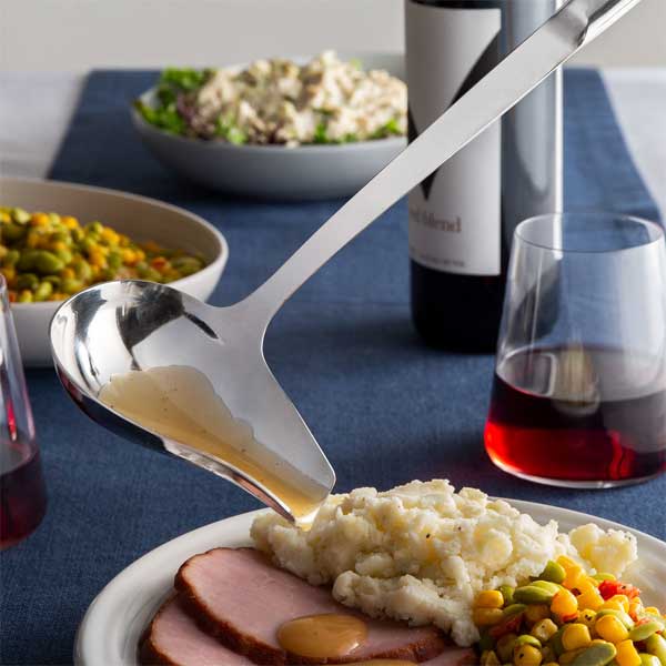 12 1/2" 1-Piece 2 oz. Serving Spout Ladle with Hollow Handle / Winco