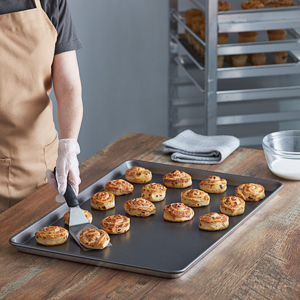 Vollrath  Wear-Ever Full Size 18 Gauge Non-Stick 18" x 26" Wire in Rim Aluminum Bun / Sheet Pan